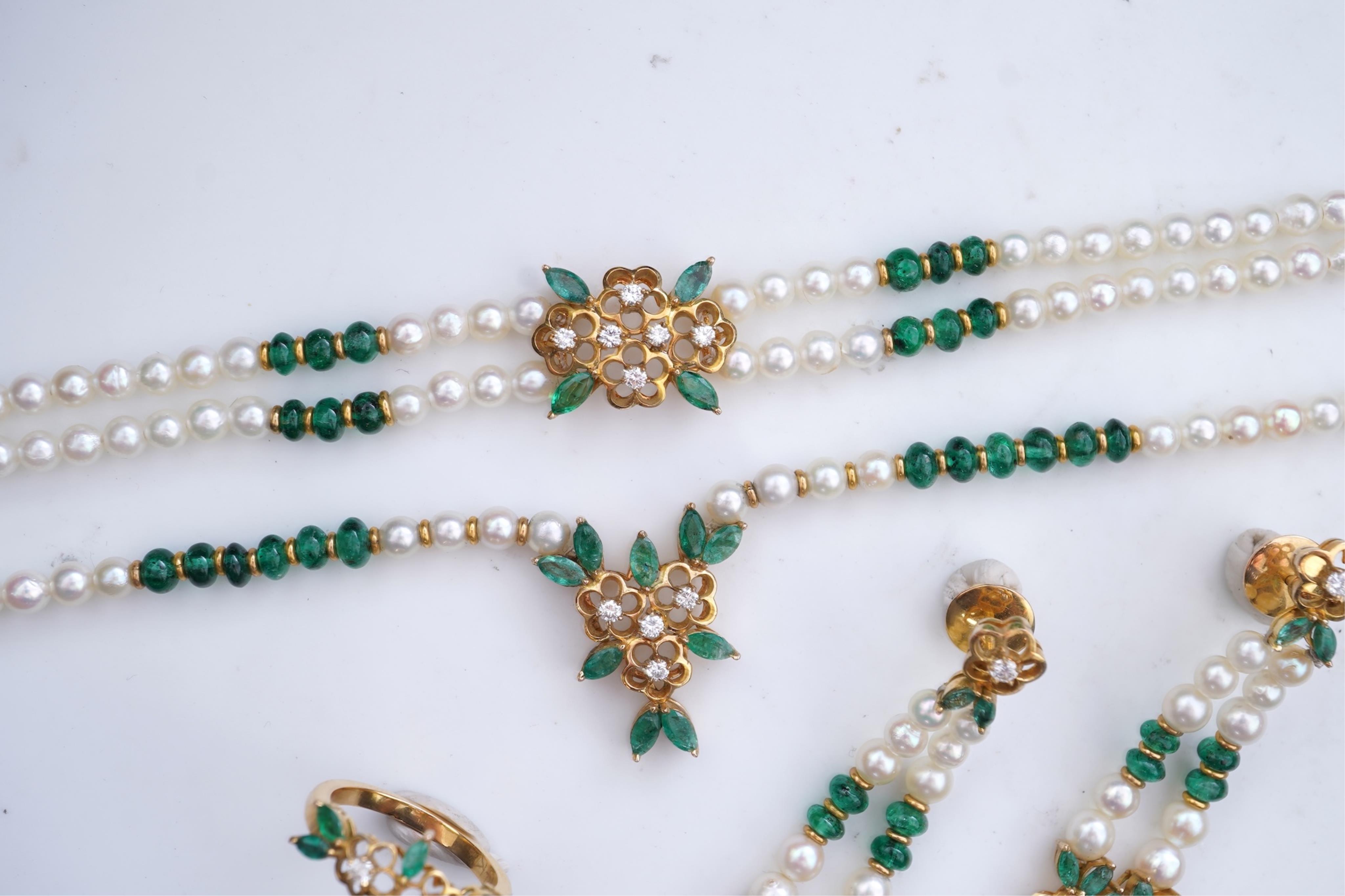 A cultured pearl, emerald and diamond parure
